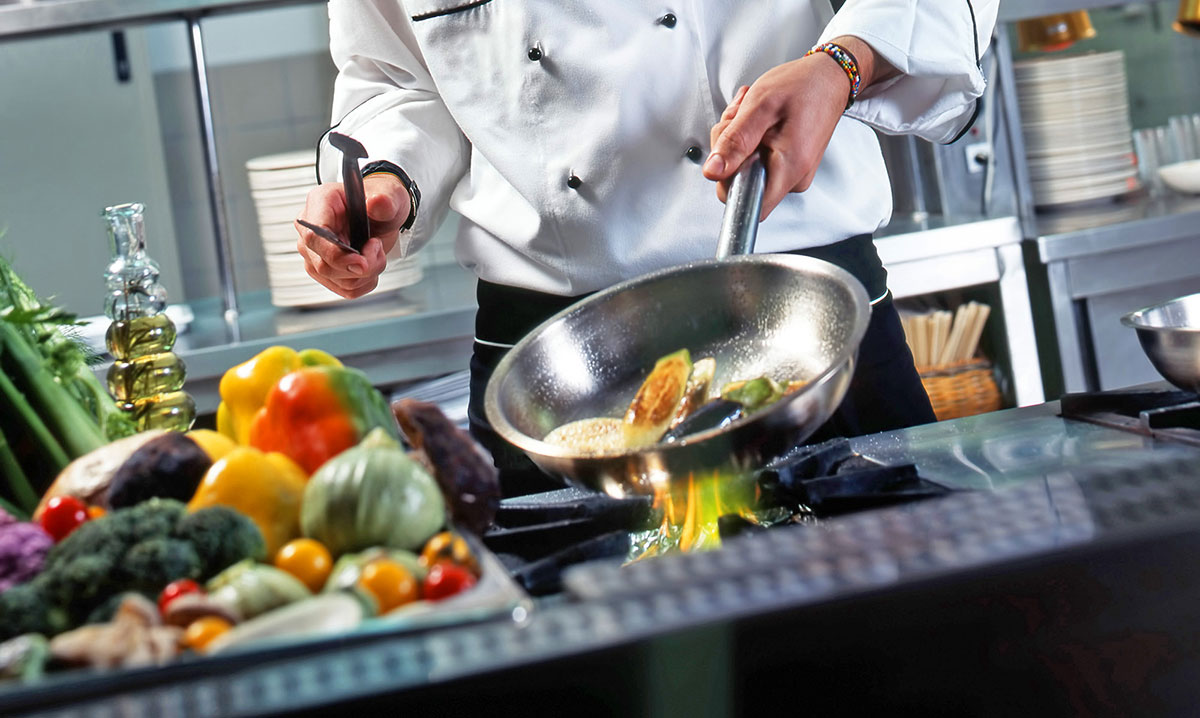 Chef preparing a meal at The Estates at Carpenters in Lakeland, Florida.