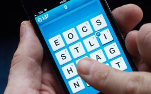 person playing wordle on their phone